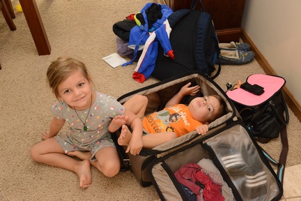 Climbing in Mommy s Suitcase4